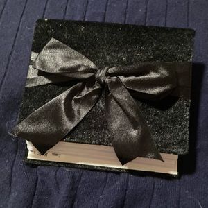 Never used Black velvet photo album that holds 100 photos in pristine condition